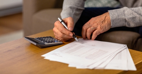 senior man with papers 