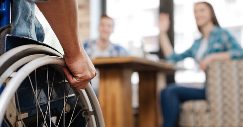 Handicapped man meeting his friends 
