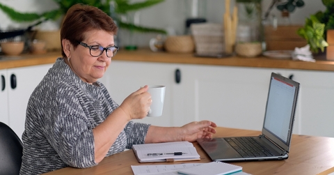 senior woman using laptop