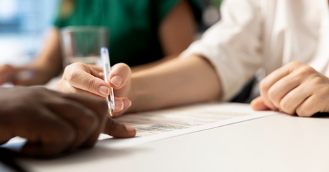 HR specialist signing contract