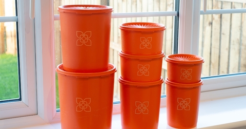 orange vintage Tupperware kitchen storage bins