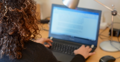woman working on laptop from home