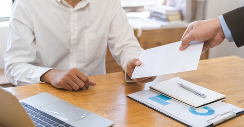 businessman giving financial reward