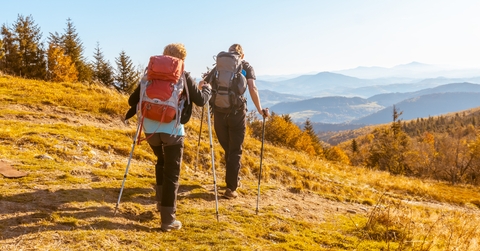 elderly people with large backpacks