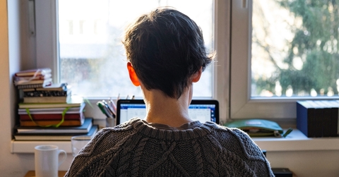 back of young caucasian entrepreneur woman