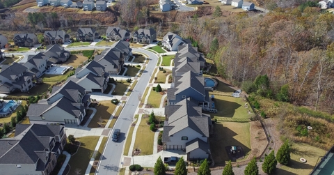 row of new developments houses in master
