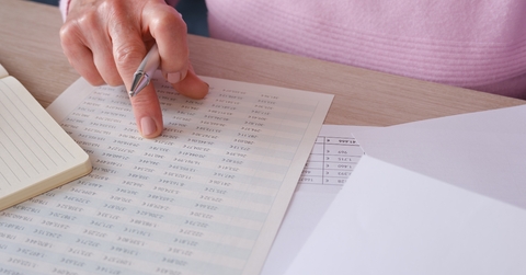 woman reviewing financial documents