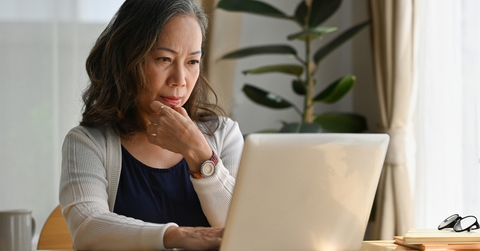 woman work at home using notebook computer