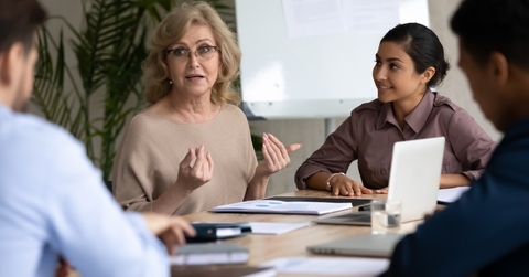 businesswoman with indian ethnic partner at meeting