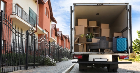 van full of moving boxes and furniture