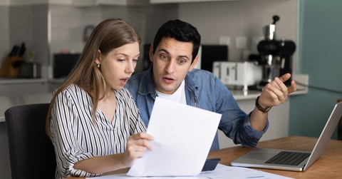 couple analyzing financial documents
