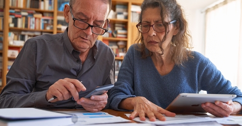 senior couple managing bills