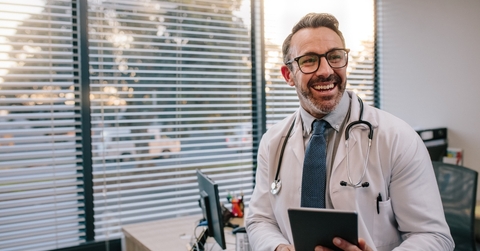 doctor with digital tablet