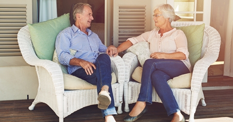 Elderly couple sharing memories