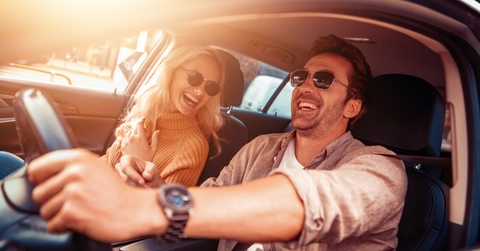 happy couple in car
