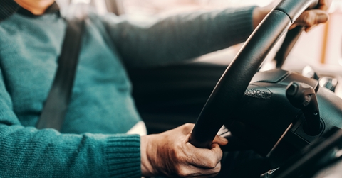 senior man driving his car