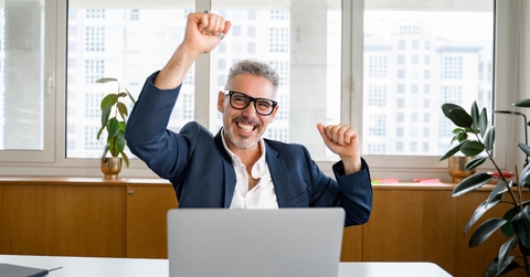 businessman is gesturing victory