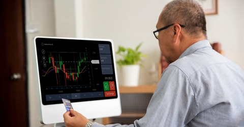  Downloaded Senior asian man using computer