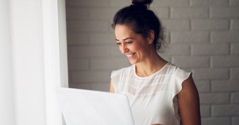 businesswoman holding a laptop
