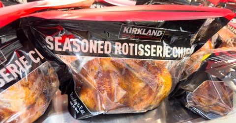 Costco Kirkland Signature fresh seasoned whole rotisserie chicken in a bag