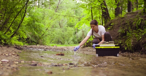 environmentalist taking sample