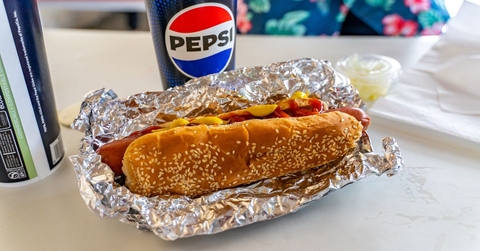 Costco hotdog with a fountain drink