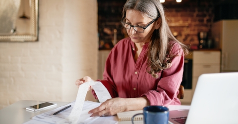 woman focused on computing finances