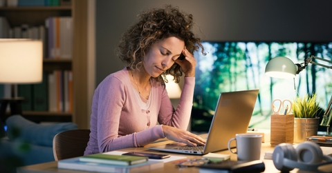 Stressed woman working from home