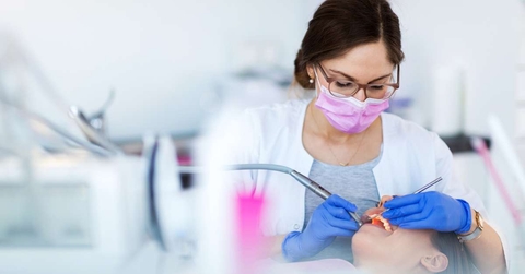 dentist and patient in dentist office