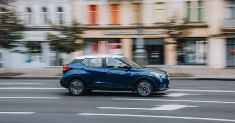 nissan kicks driving on city road