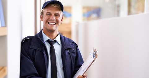 Postal service worker smiling