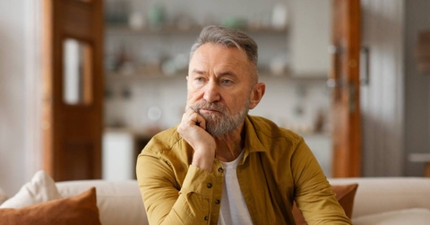Portrait of thoughtful senior man looking away