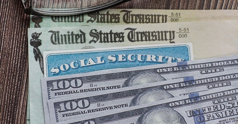 social security card check and hundred dollar bills
