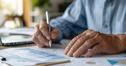 An elderly person discussing annuities with a financial advisor
