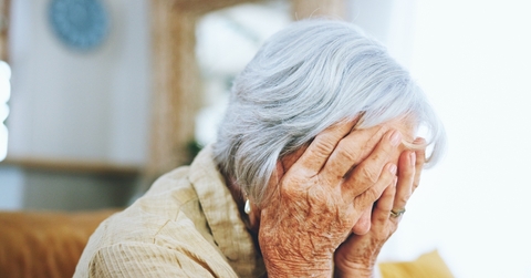 An old woman frustrated