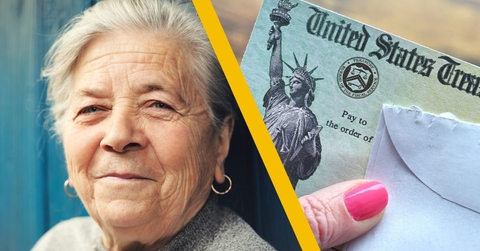 older woman smiling with social security check