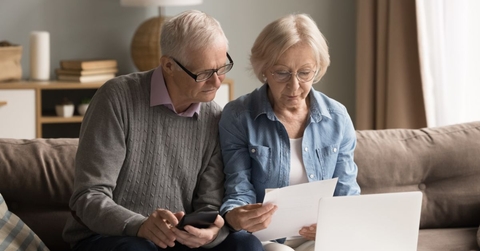 older couple doing paperwork
