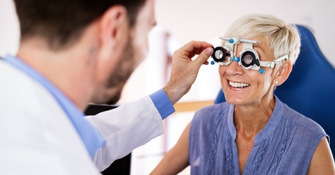 older woman getting eye exam