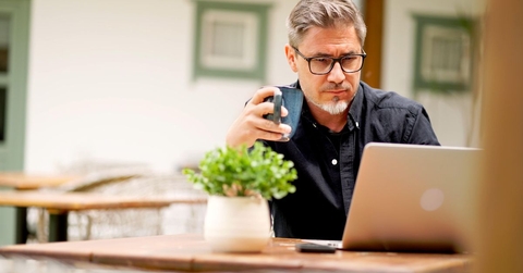 middle aged man on laptop