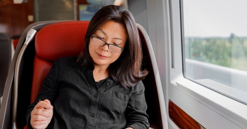 Asian woman riding the train