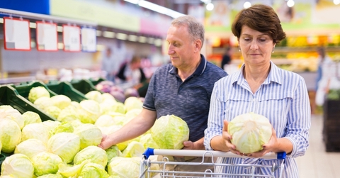 Mature couple doing groceries