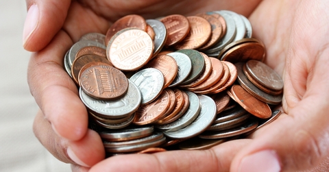 Hand full of coins