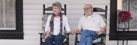 Older couple sitting on porch 2